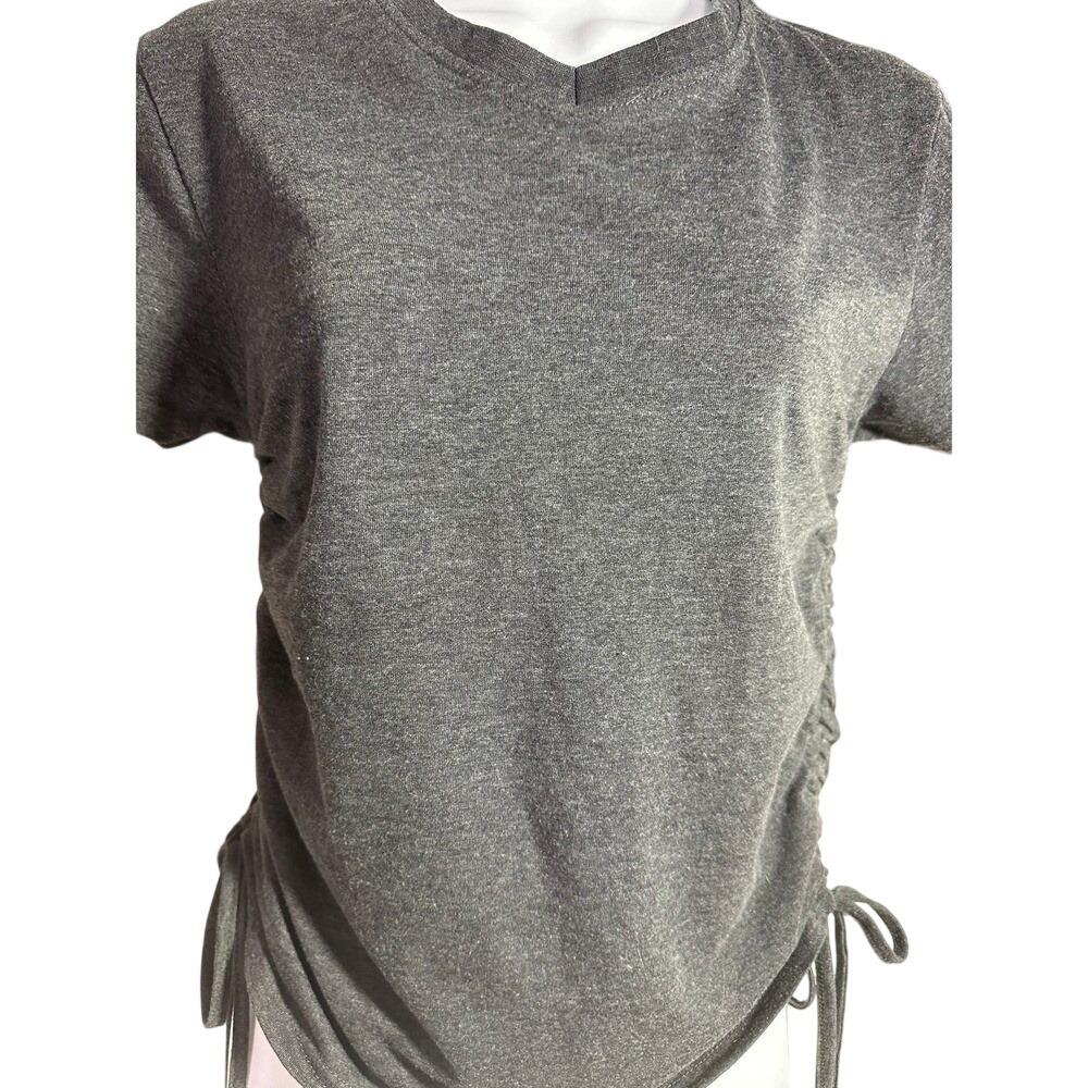 Adorable, juniors T-shirt with adjustable side new !  Small by just active